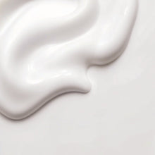 Load image into Gallery viewer, Bakuchiol Face Cream spread onto a white background