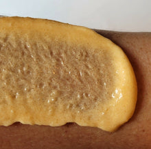 Load image into Gallery viewer, Orange Creamsicle Body Scrub by Brody Brielle spread onto skin