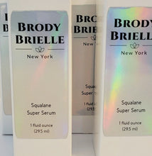 Load image into Gallery viewer, Brody Brielle Squalane Super Serum packaging with rainbow gradient on a white background
