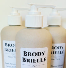 Load image into Gallery viewer, Three bottles of Brody Brielle hand and body lotion on a white background
