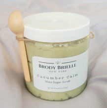 Load image into Gallery viewer, Jar of Brody Brielle Green Tea + Cucumber sugar scrub with a wooden spoon attached on a light background
